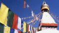 Buddhist prayer flags streaming down from the Bodhnath Stupa in Kathmandu